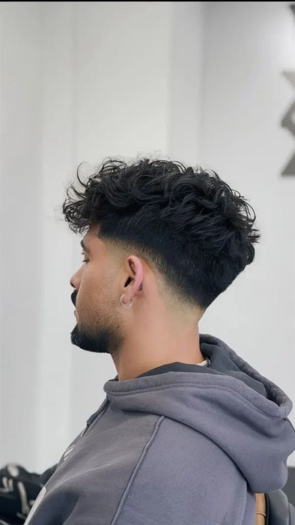 Low Skin Fade Haircut With Firing On Top