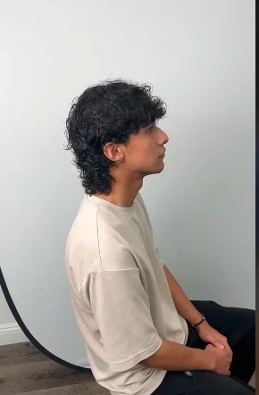 wavy wolf cut men curly hair